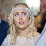 Bride wearing vintage headpiece and veil